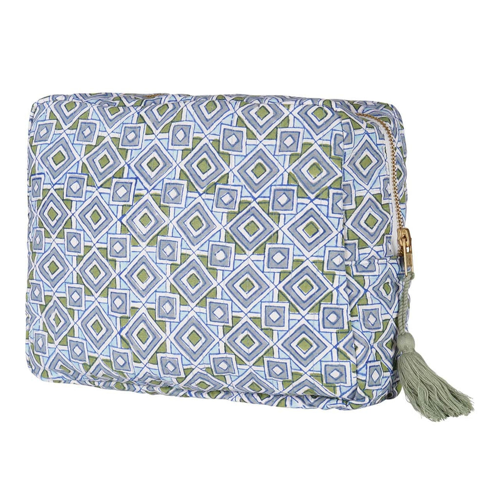 A multicolored hand block-printed vanity pouch with a zip and a small tassel, displayed against a plain background.