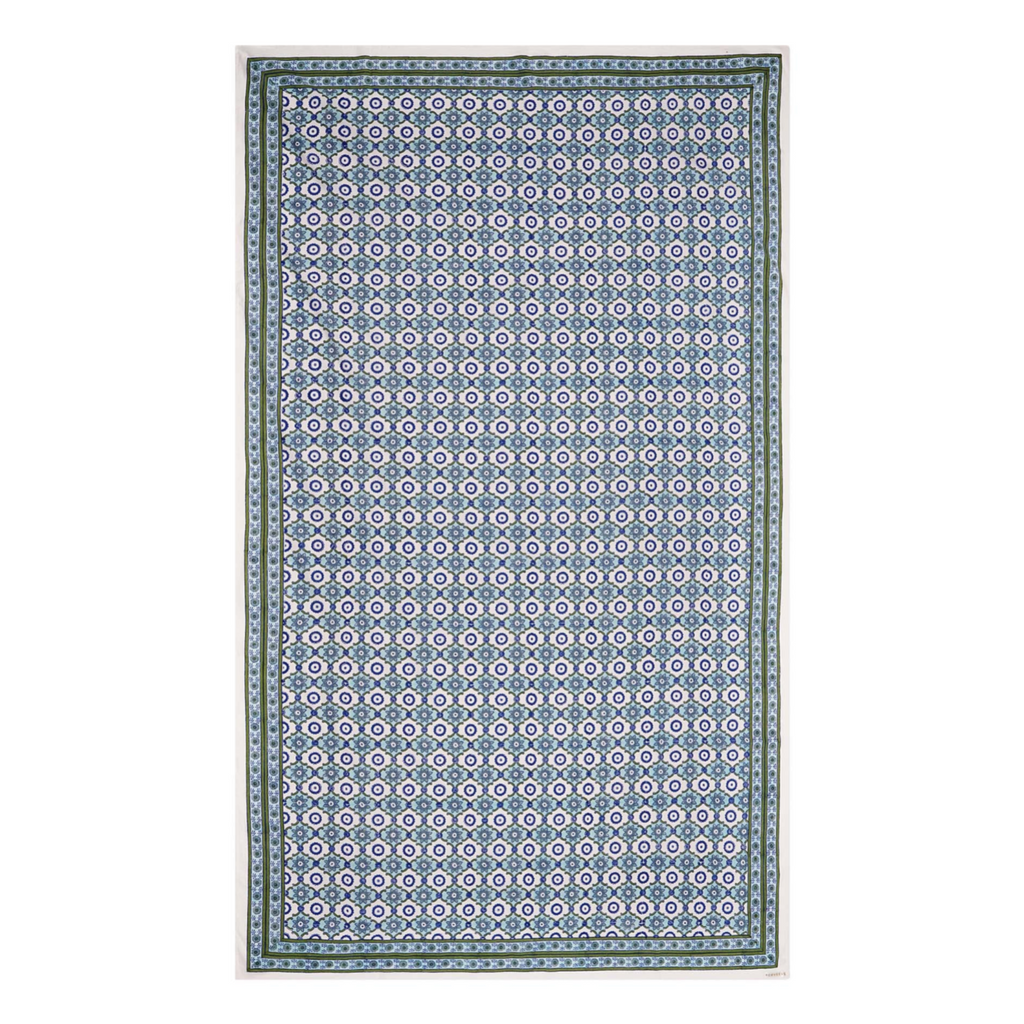 A rectangular tablecloth with a floral pattern in shades of blue and green, displayed on a white background.