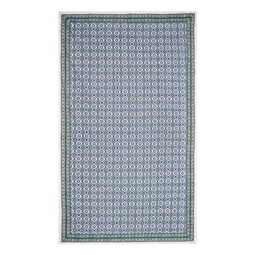 A rectangular tablecloth with a floral pattern in shades of blue and green, displayed on a white background.