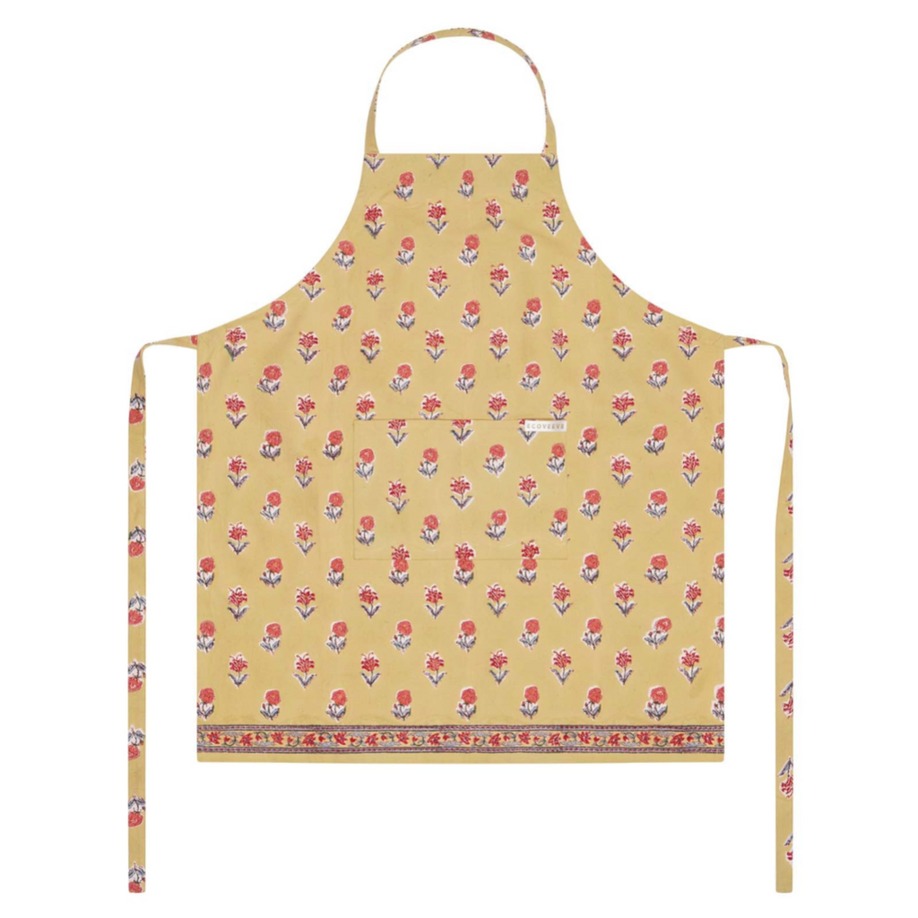 Yellow block printed apron with floral pattern on a white background