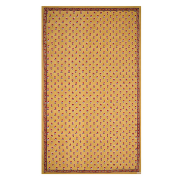 A rectangular tablecloth with a golden yellow base and small floral motifs, with a decorative border.