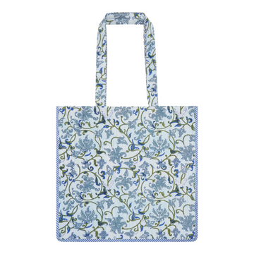 A block printed cotton tote bag with contrast trim and a botanical design