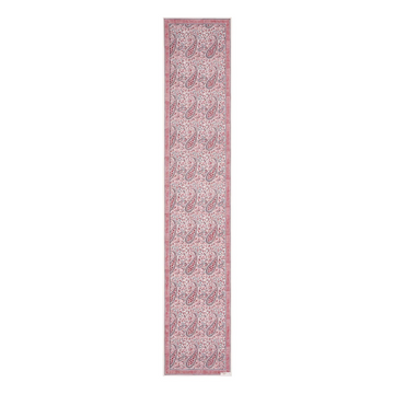 Long narrow block printed paisley design pink and white patterned table runner on a white background