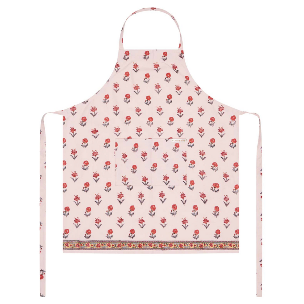 Floral patterned block printed apron on a white background